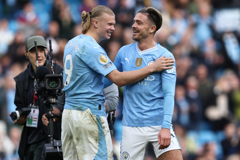 Jack Grealish and Erling Haaland pictured together during Man City's Premier League match with Wolves on May 4th 2024.