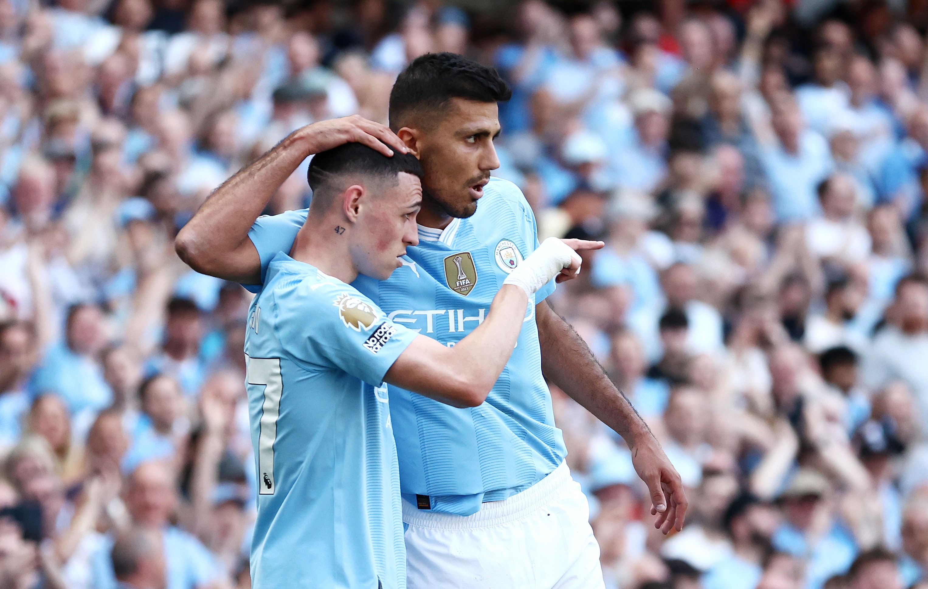 Phil Foden (left) and Rodri pictured during Manchester City's win over West Ham on the final day of the 2023/24 Premier League season Man City Rodri Premier League Real Madrid
