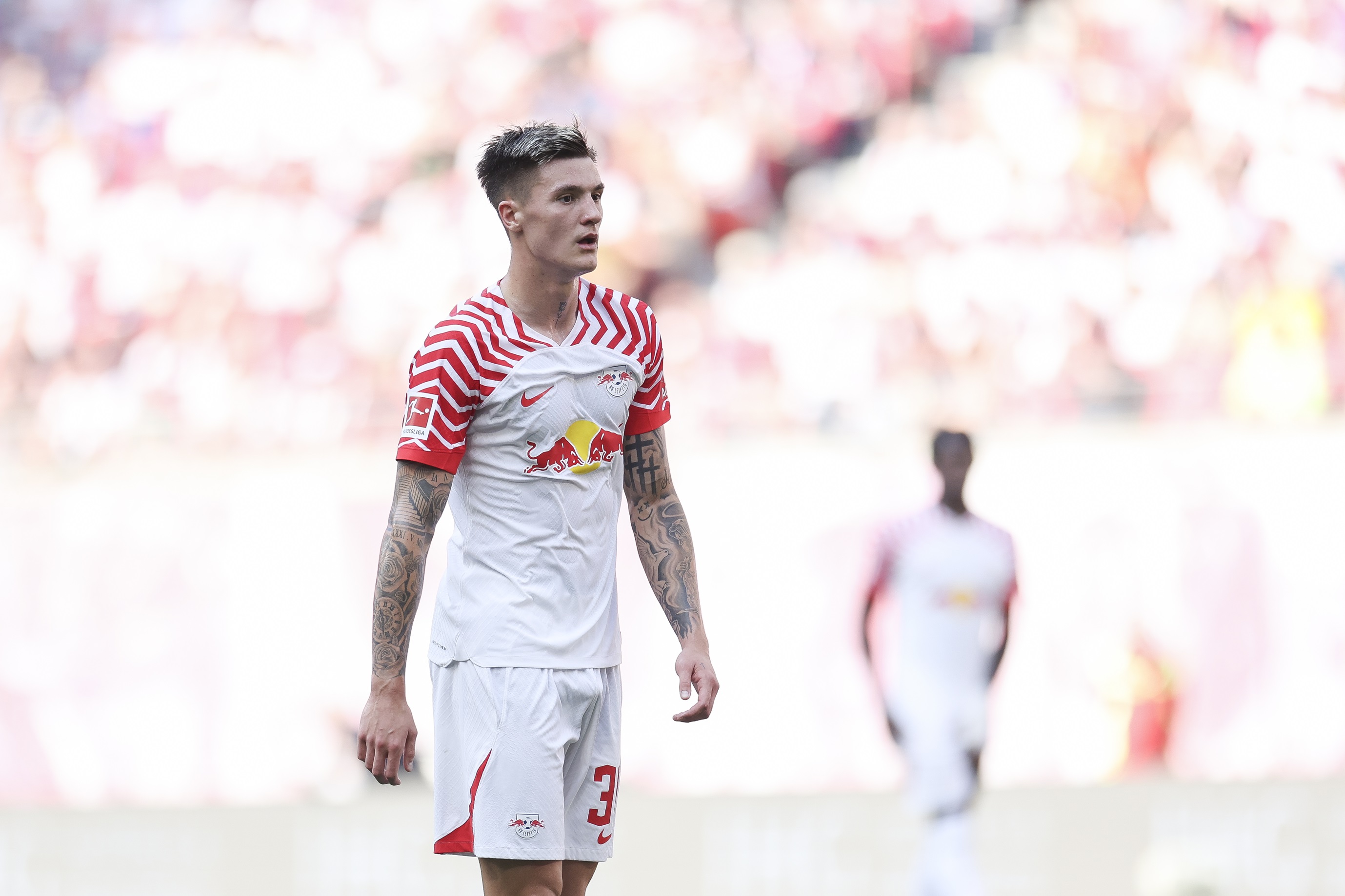 Benjamin Sesko of RB Leipzig looks on during the Bundesliga match between RB Leipzig and SV Werder Bremen at Red Bull Arena on May 11, 2024 in Leipzig, Germany.
