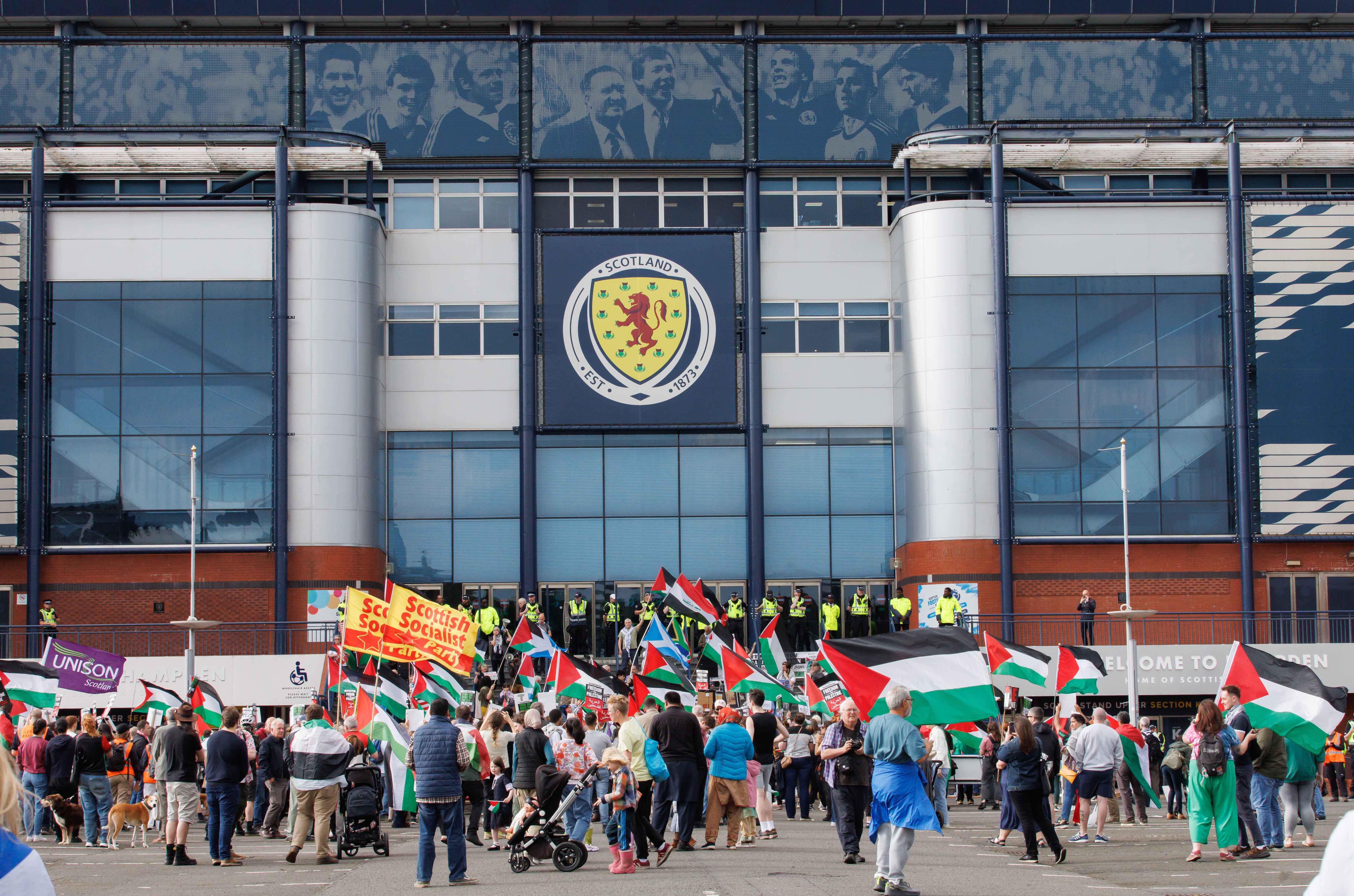 Protesters pictured outside of Hampden Park before a UEFA Women's Euro 2025 qualifier between Scotland and Israel in May 2024 Protesters pictured outside of Hampden Park before a UEFA Women's Euro 2025 qualifier between Scotland and Israel in May 2024
