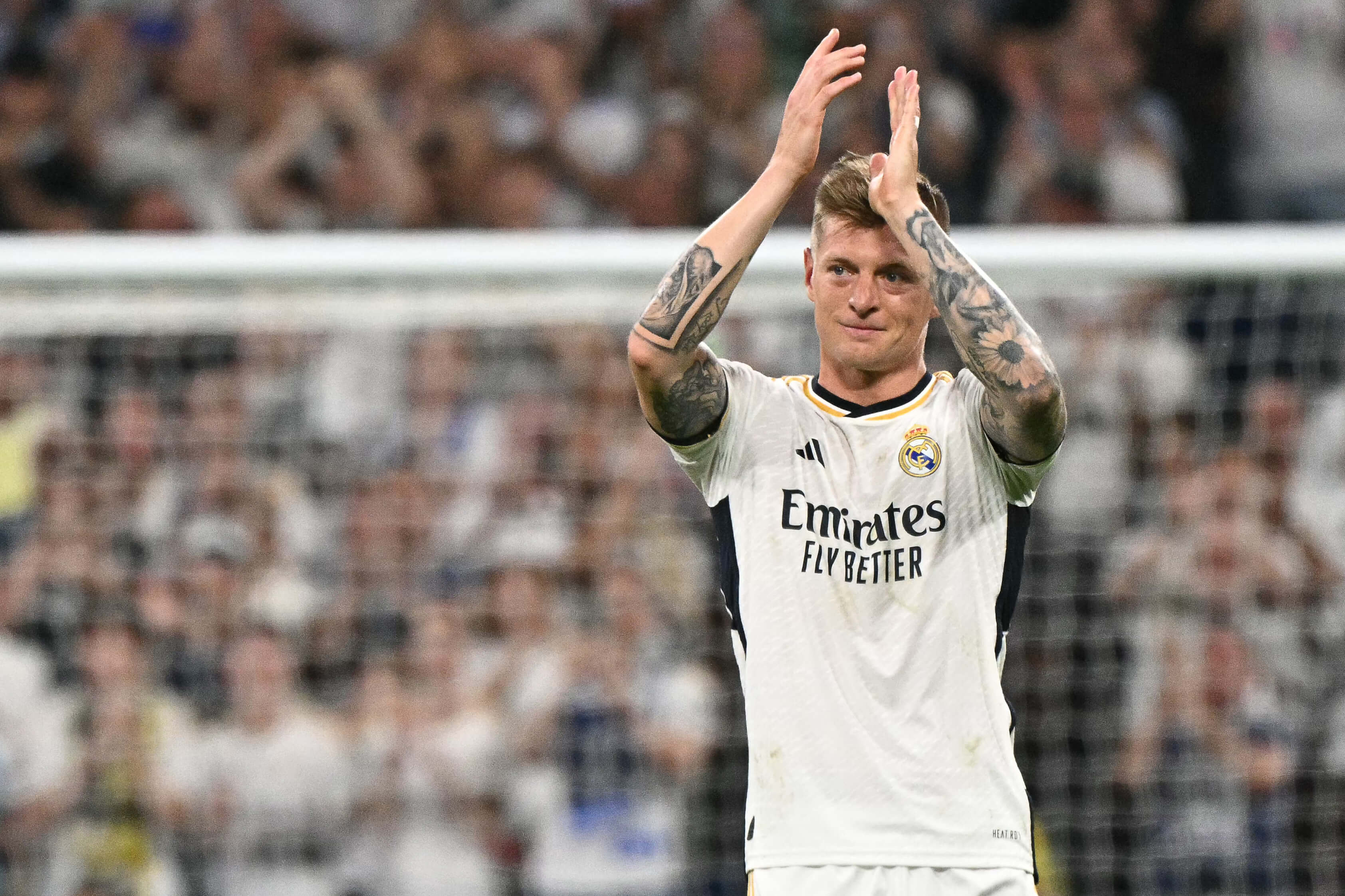 Toni Kroos gestures as he leaves the pitch during the Spanish league football match between Real Madrid CF and Real Betis at the Santiago Bernabeu stadium in Madrid on May 25, 2024.
