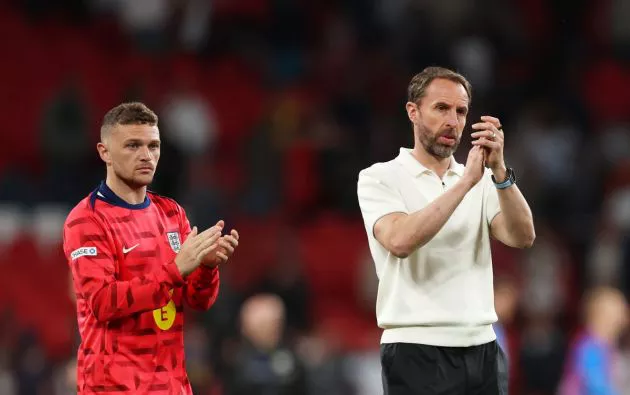 Kieran Trippier of England and Gareth Southgate, Head Coach of England, applaud the fans after the team's defeat in the international friendly match between England and Iceland at Wembley Stadium on June 07, 2024