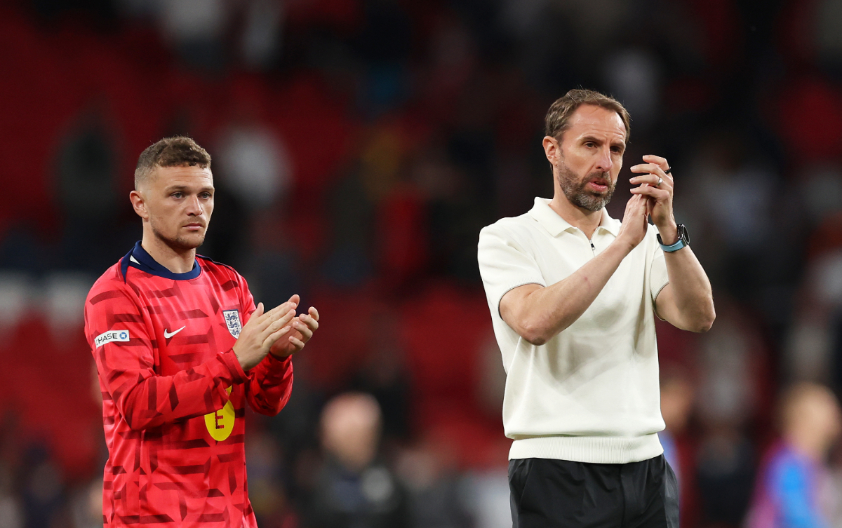 Kieran Trippier of England and Gareth Southgate, Head Coach of England, applaud the fans after the team's defeat in the international friendly match between England and Iceland at Wembley Stadium on June 07, 2024
