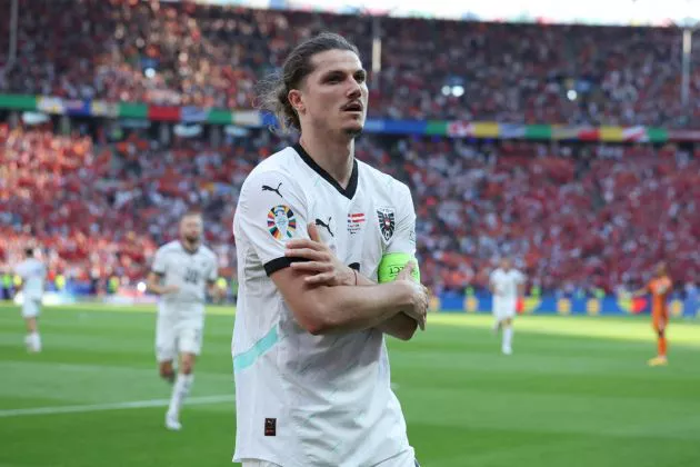 Marcel Sabitzer celebrates scoring his team's third goal during the UEFA Euro 2024 Group D football match between the Netherlands and Austria at the Olympiastadion in Berlin on June 25, 2024.