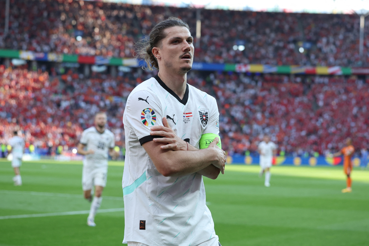 Marcel Sabitzer celebrates scoring his team's third goal during the UEFA Euro 2024 Group D football match between the Netherlands and Austria at the Olympiastadion in Berlin on June 25, 2024.