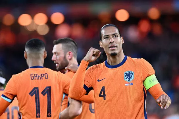 Virgil van Dijk celebrates after scoring his teams second goal during the International friendly football match between Netherlands and Iceland at the Feyenoord Stadium, in Rotterdam, on June 10, 2024.