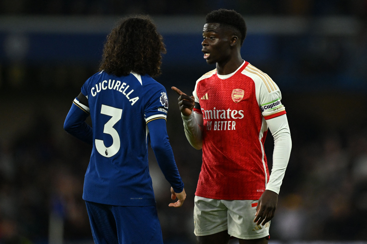 Chelsea's Spanish defender #03 Marc Cucurella (L) and Arsenal's English midfielder #07 Bukayo Saka (R) have words during the English Premier League football match between Chelsea and Arsenal at Stamford Bridge in London on October 21, 2023.