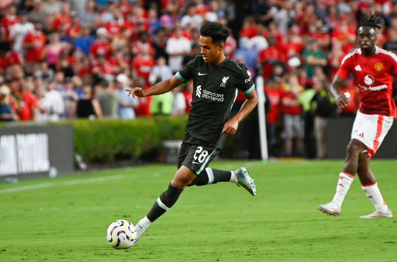 Liverpool's Portuguese midfielder #28 Fabio Carvalho runs with the ball during the pre-season club friendly football match between Manchester United and Liverpool at Williams-Brice Stadium in Columbia, South Carolina, August 3, 2024.