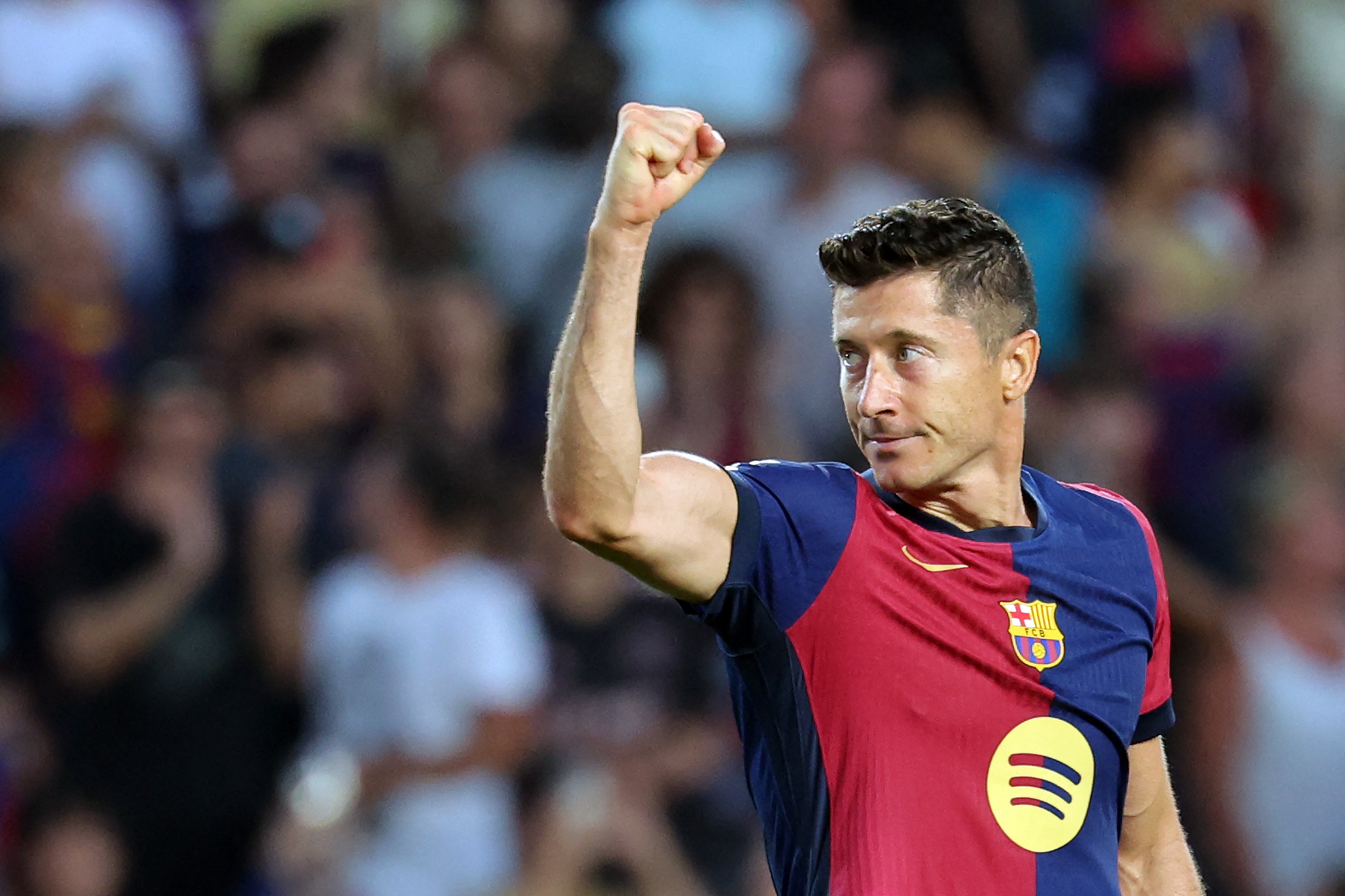 Barcelona's Polish forward #09 Robert Lewandowski celebrates scoring his team's second goal