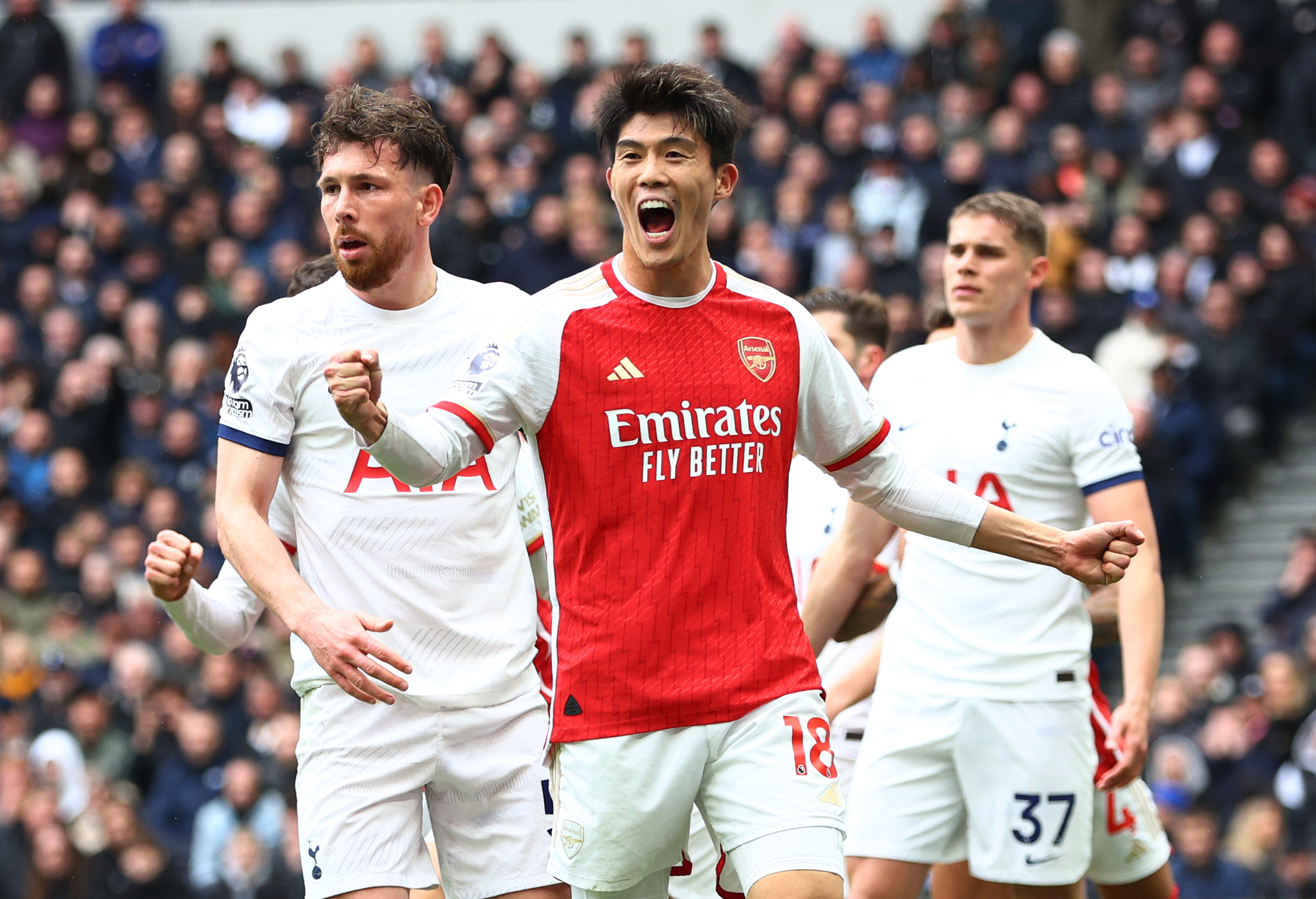 LONDON, ENGLAND - APRIL 28: Takehiro Tomiyasu of Arsenal celebrates after Pierre-Emile Hojbjerg of Tottenham Hotspur scored an own goal, Arsenal's first goal during the Premier League match between Tottenham Hotspur and Arsenal FC at Tottenham Hotspur Stadium on April 28, 2024 in London, England. Inter Milan want to sign Takehiro Tomiyasu in January (Photo by Clive Rose/Getty Images)