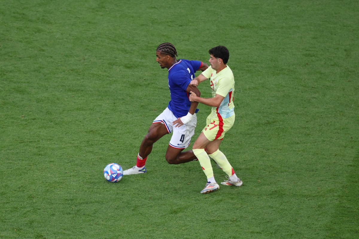 Loic Bade in action for France
