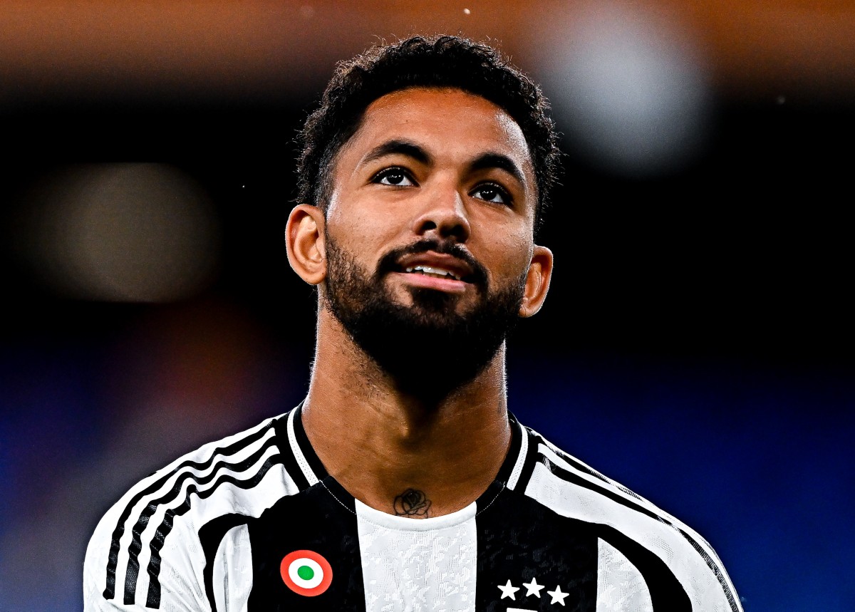 Juventus midfielder Douglas Luiz looks on