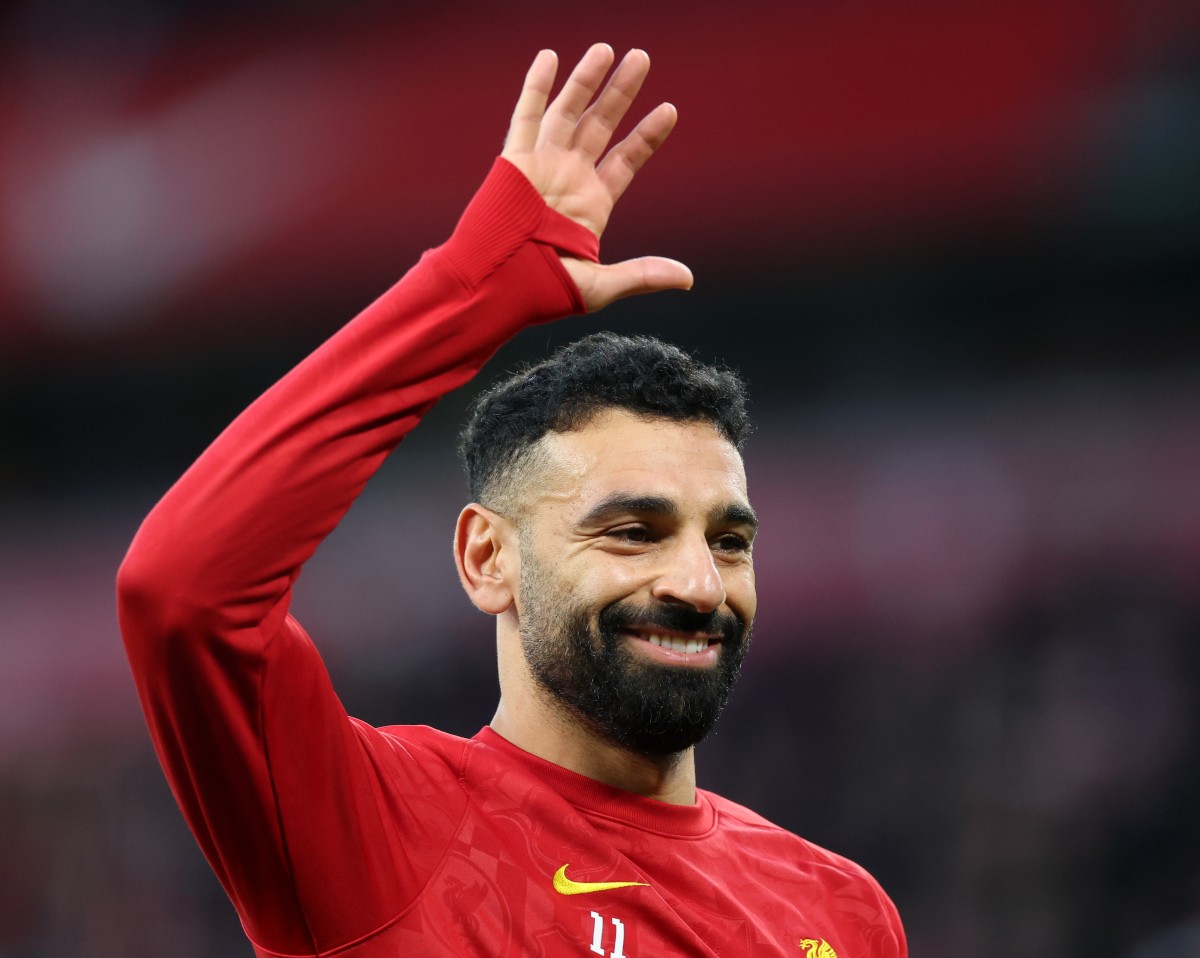 Mohamed Salah waves to the fans during Liverpool vs Man City