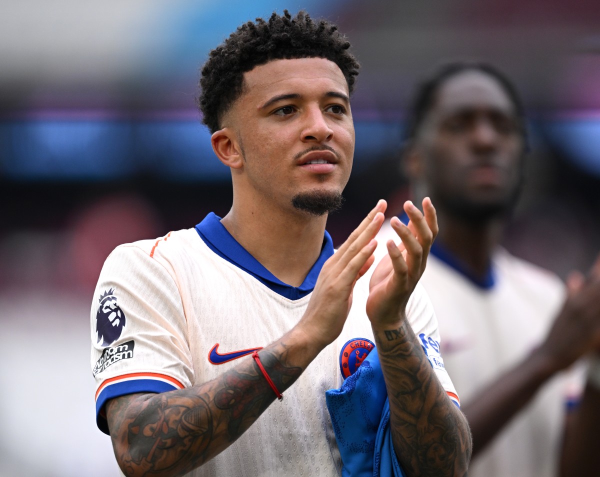 Jadon Sancho applauds the Chelsea fans