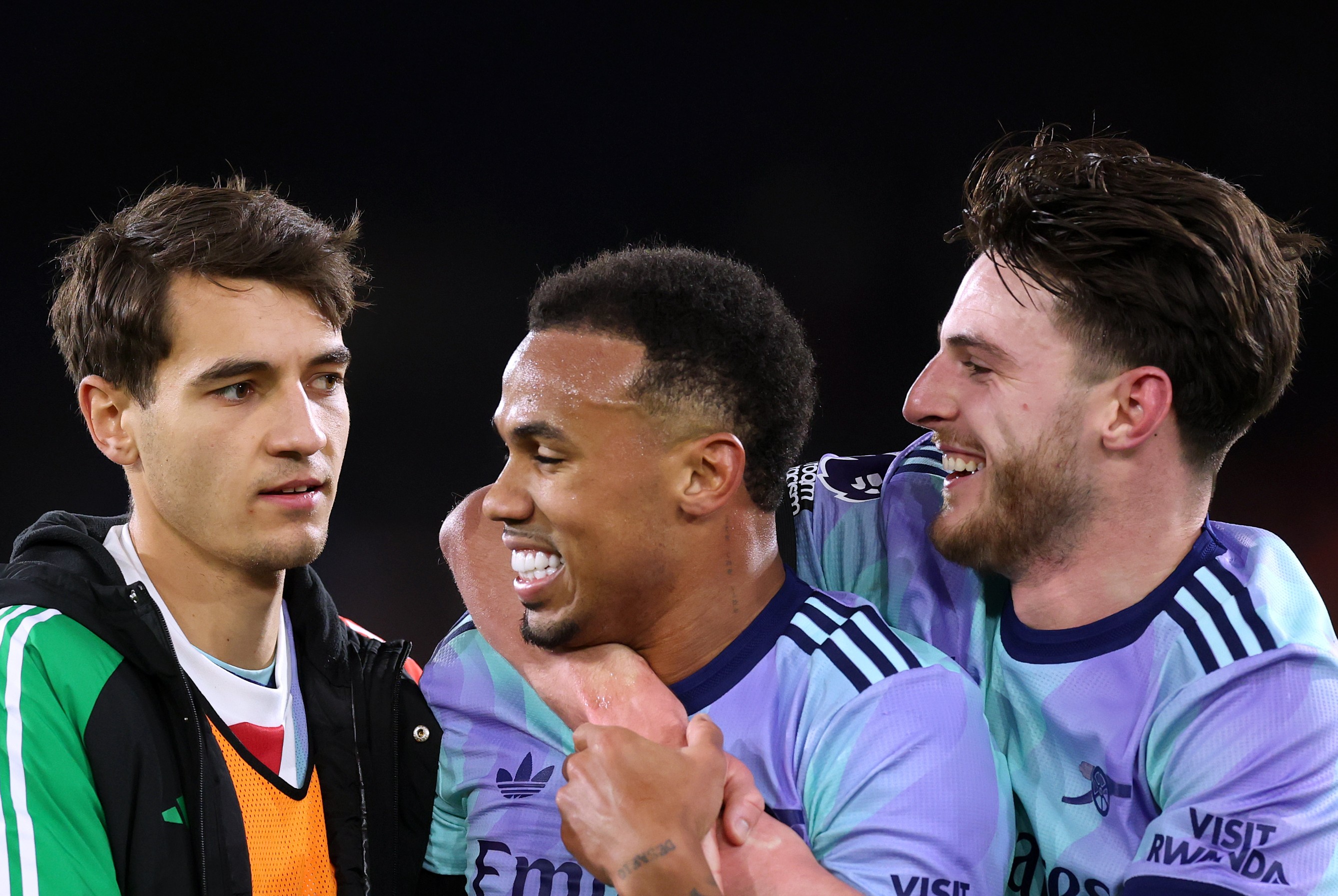 Gabriel of Arsenal celebrates victory with teammates Jakub Kiwior and Declan Rice