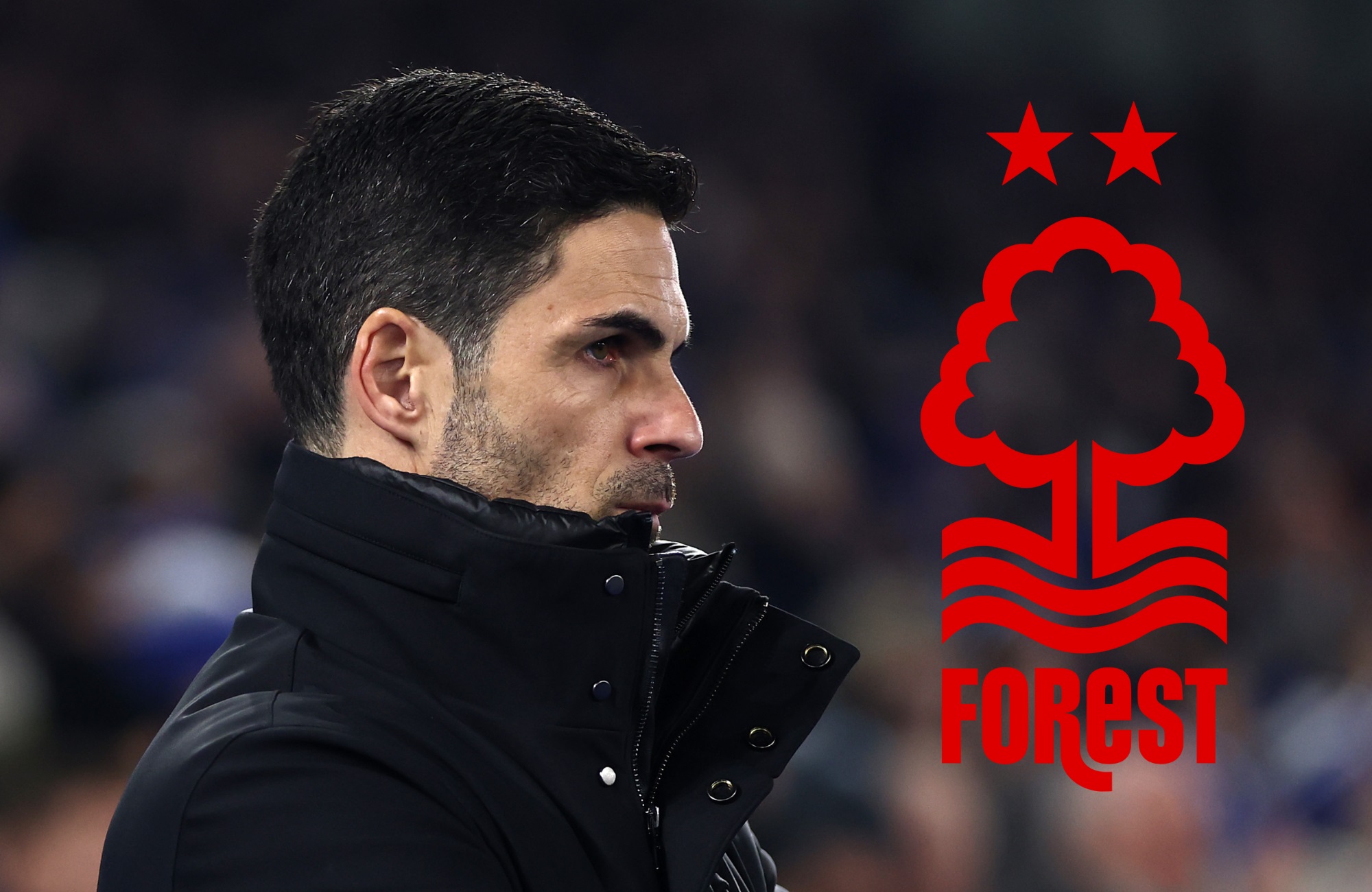 A disappointed Mikel Arteta looks at the Nottingham Forest club badge.
