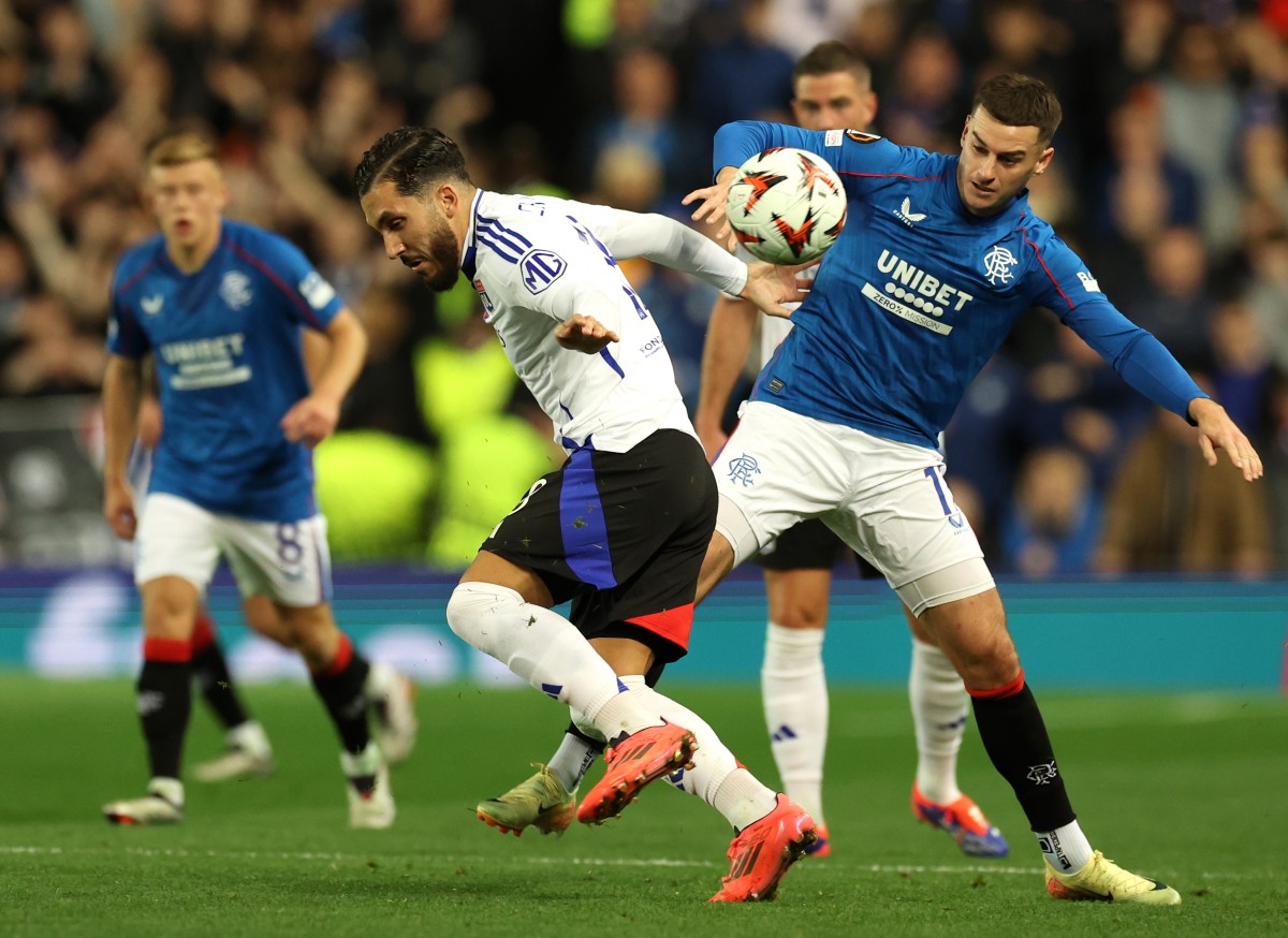 Rayan Cherki in action for Lyon against Rangers