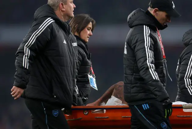 Gabriel Jesus of Arsenal leaves the pitch on a stretcher