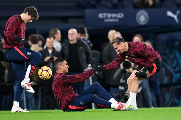 Casemiro and Antony of Manchester United interact as they warm up