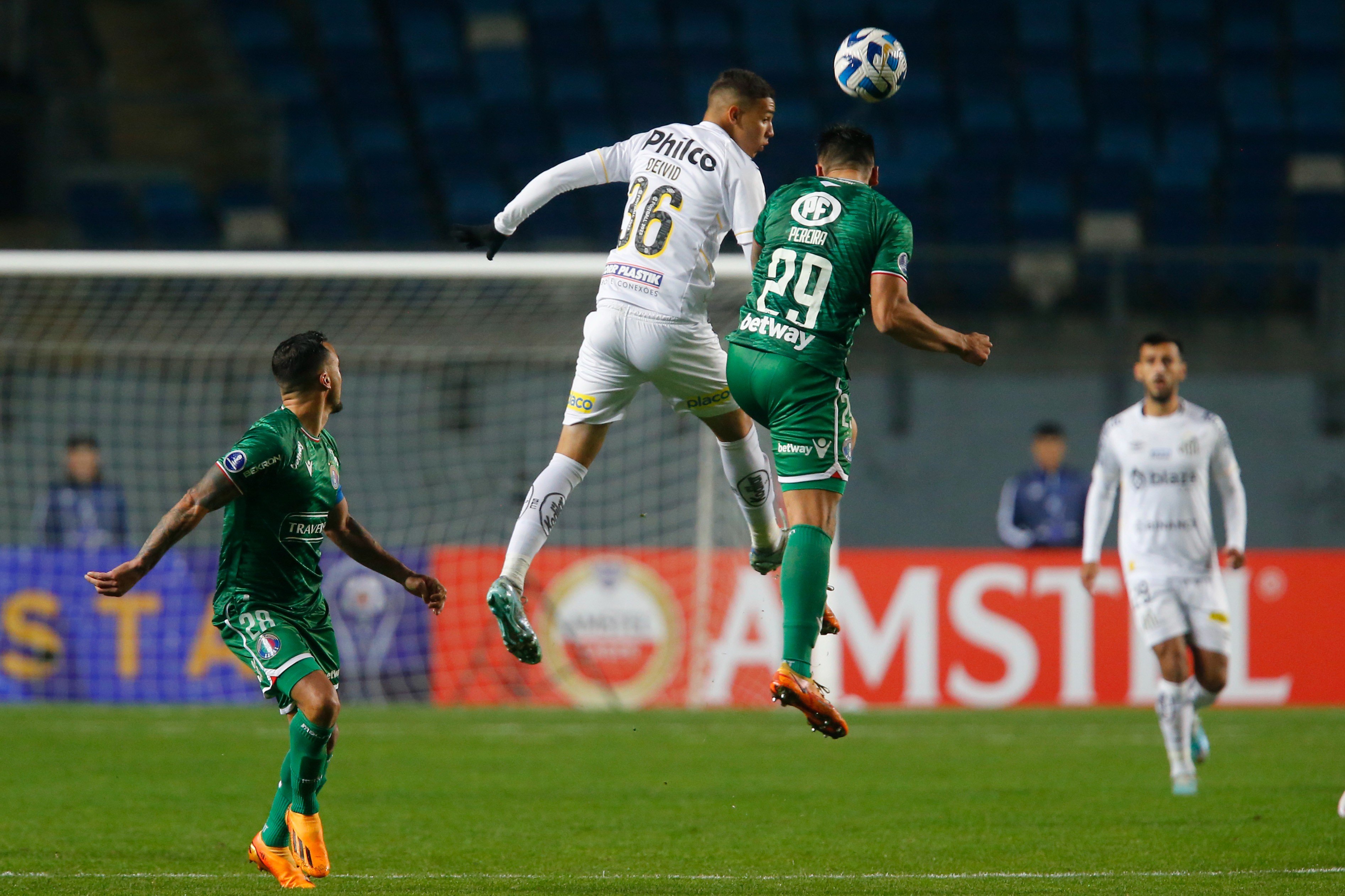 Deivid Washington of Santos heads the ball