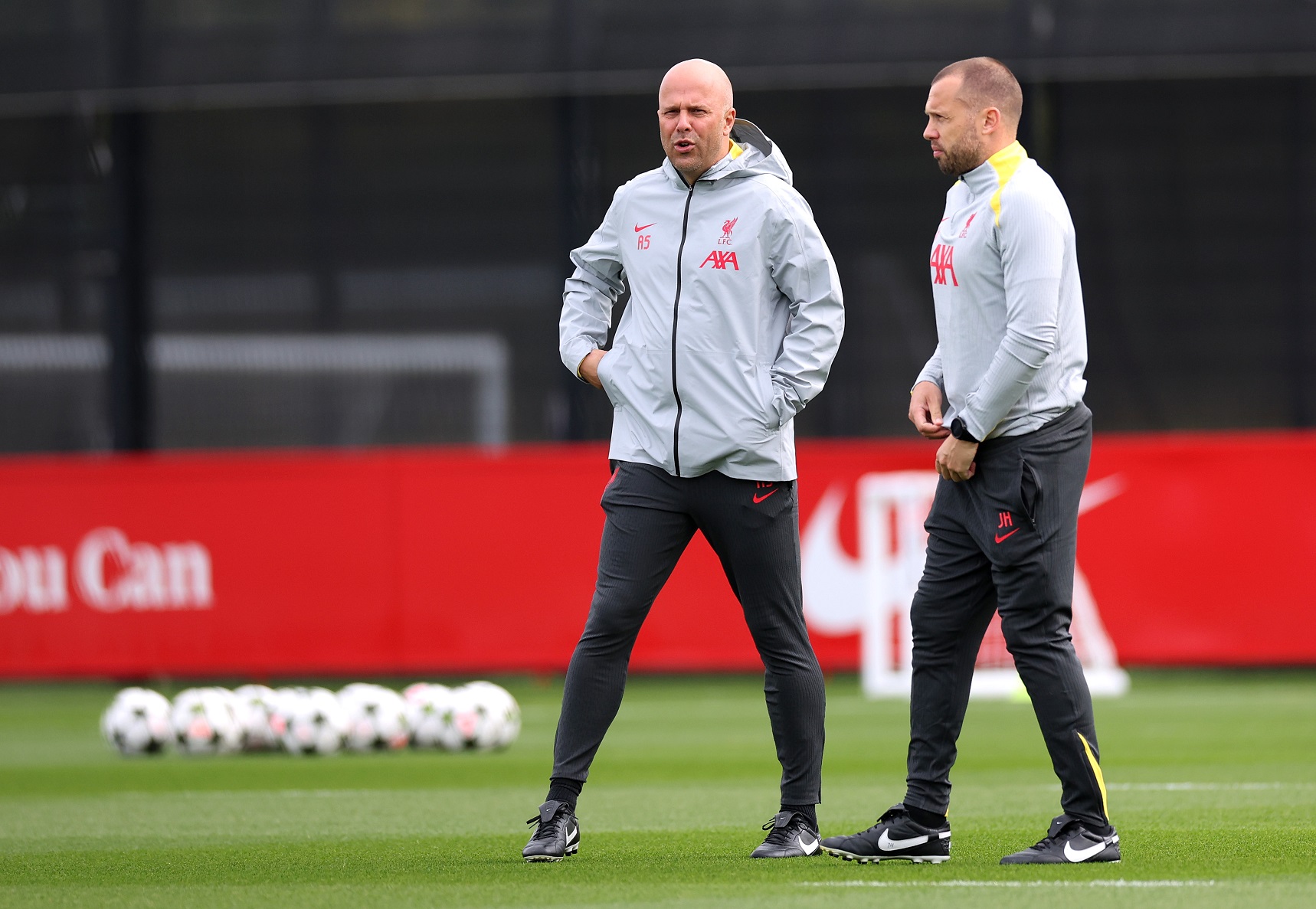 Liverpool coach John Heitinga with manager Arne Slot