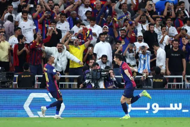 Robert Lewandowski of FC Barcelona celebrates scoring his team's second goal with team mate Raphinha