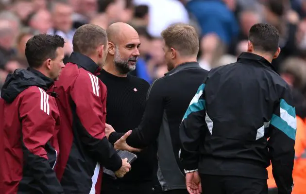 Pep Guardiola, Manager of Manchester City, interacts with Eddie Howe, Manager of Newcastle United