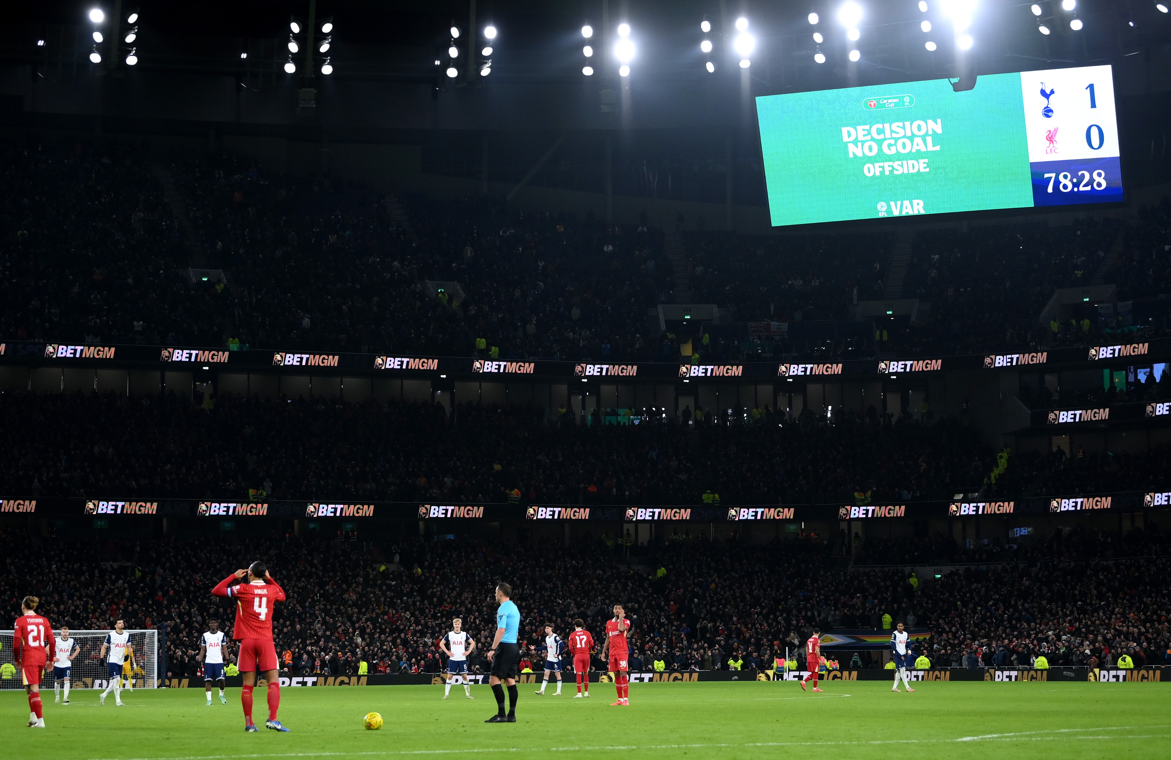 The decision to disallow a goal scored by Dominic Solanke of Tottenham Hotspur for offside is displayed on the big screen following a VAR check