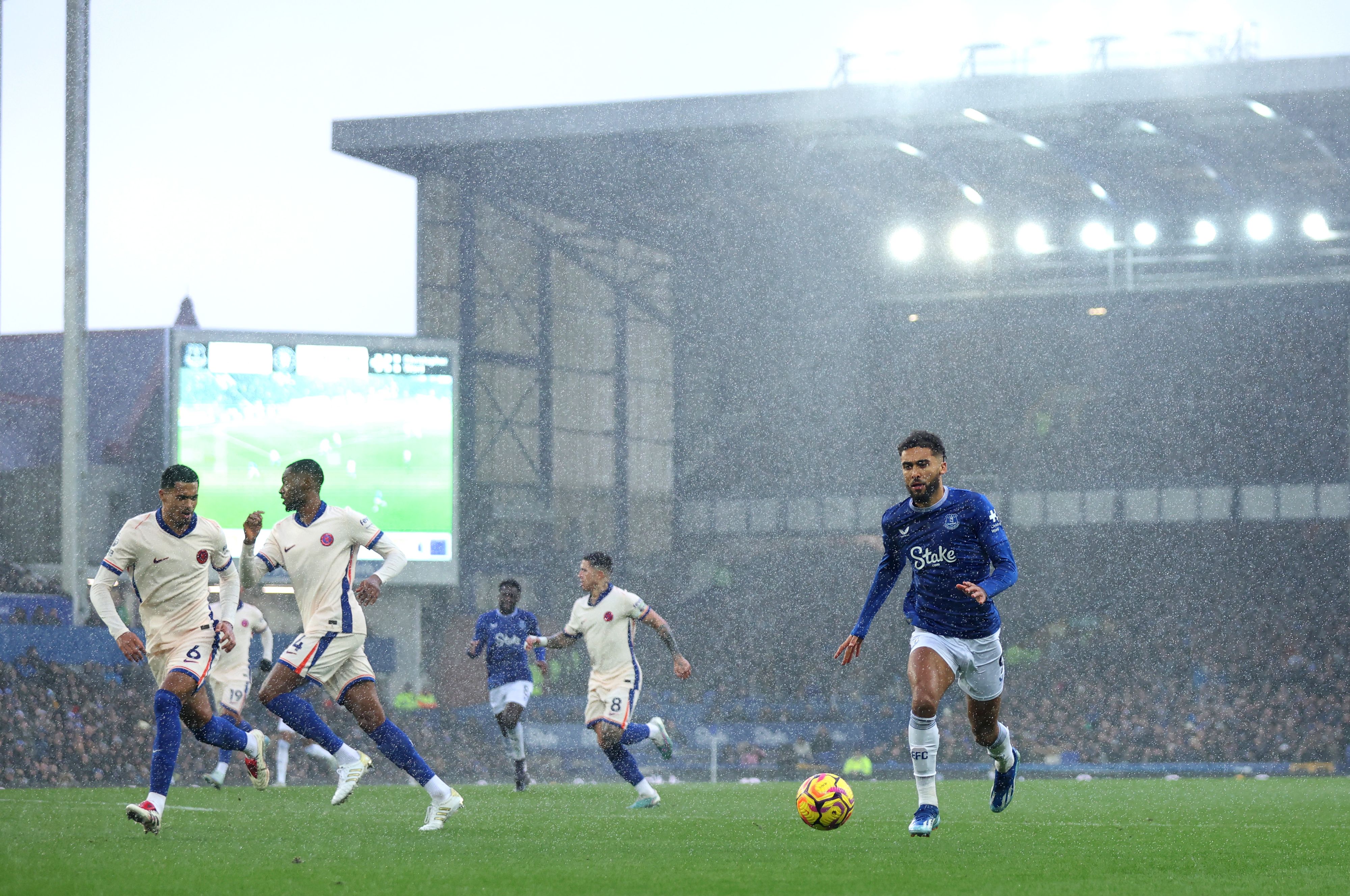 Dominic Calvert-Lewin of Everton runs with the ball against Chelsea FC at Goodison Park.