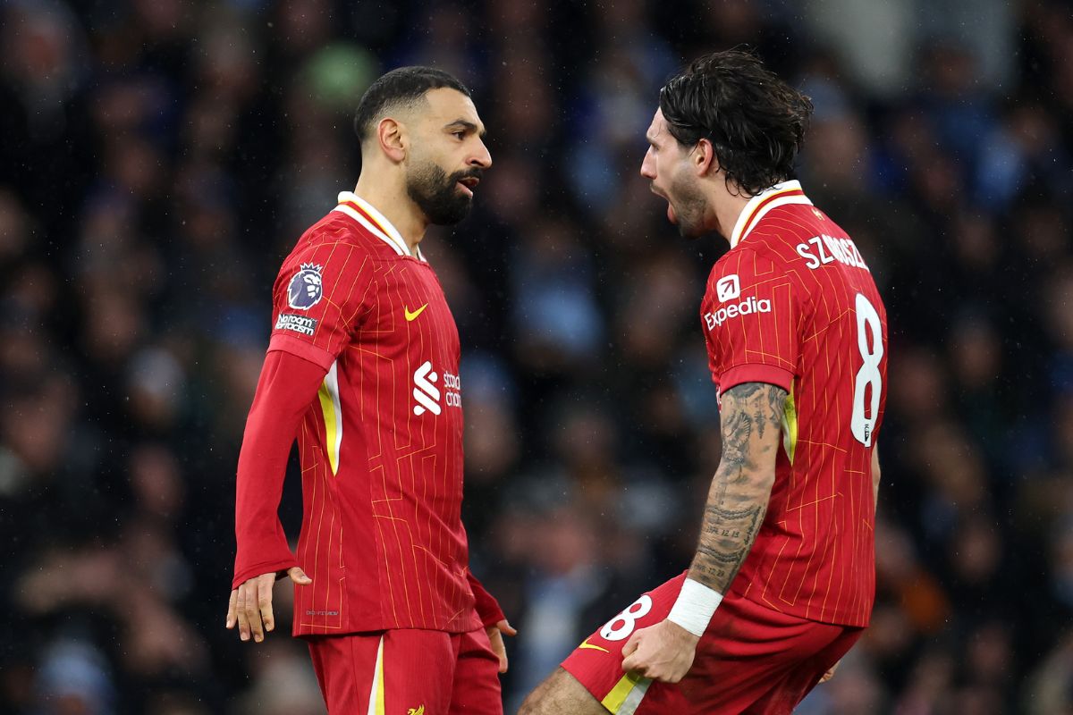 Dominik Szoboszlai of Liverpool celebrates scoring his team's second goal with teammate Mohamed Salah