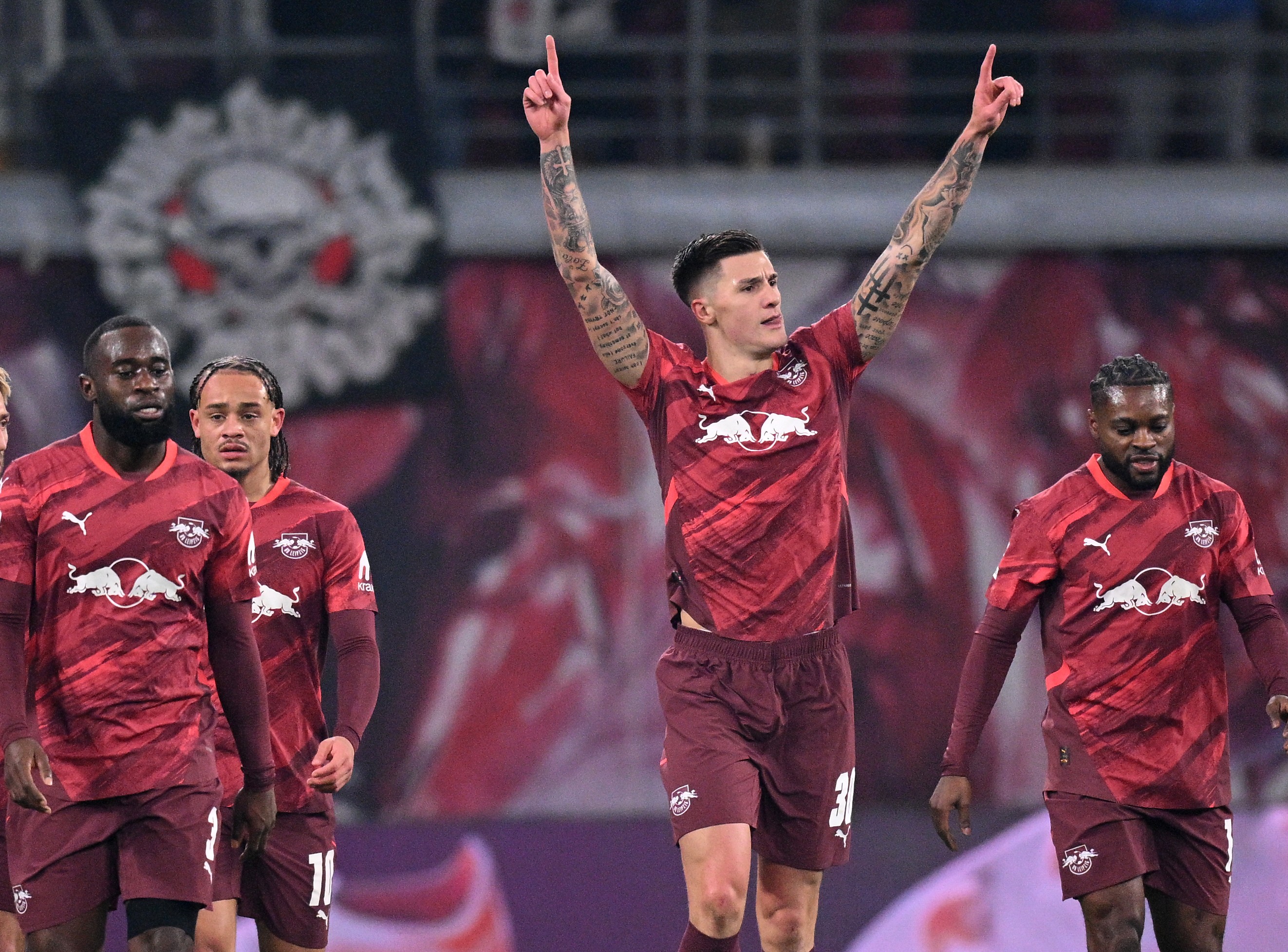 Benjamin Sesko of RB Leipzig celebrates scoring