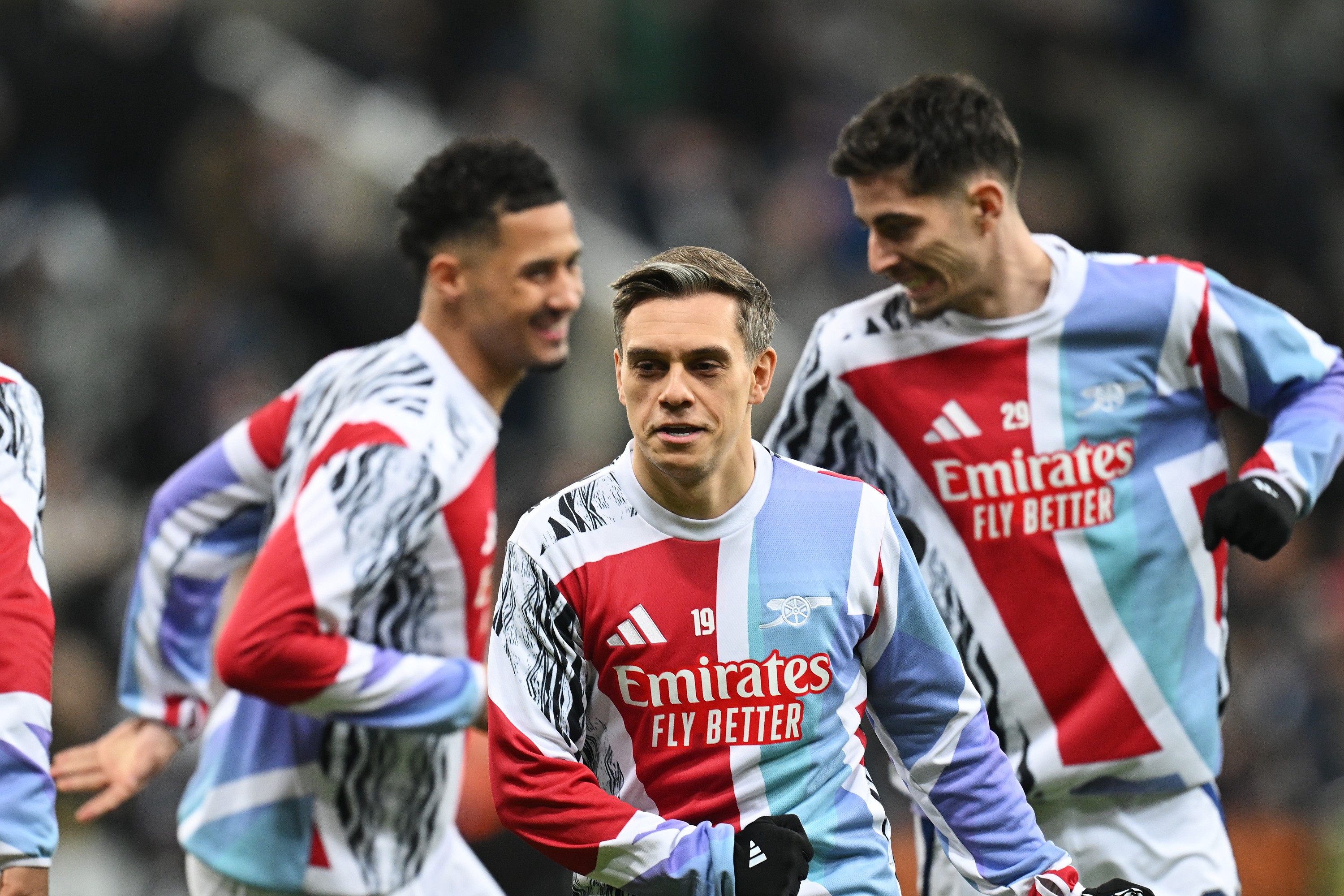 Leandro Trossard of Arsenal and teammates warm up prior to the Carabao Cup Semi Final Second Leg match against Newcastle United.