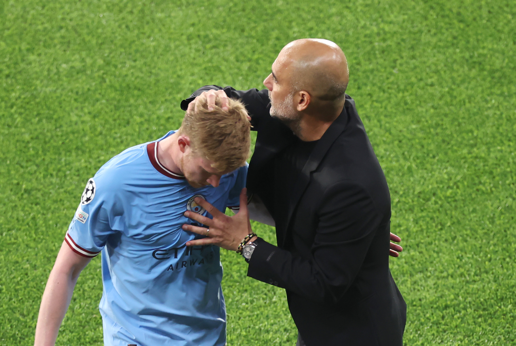 Pep Guardiola embraces Kevin De Bruyne