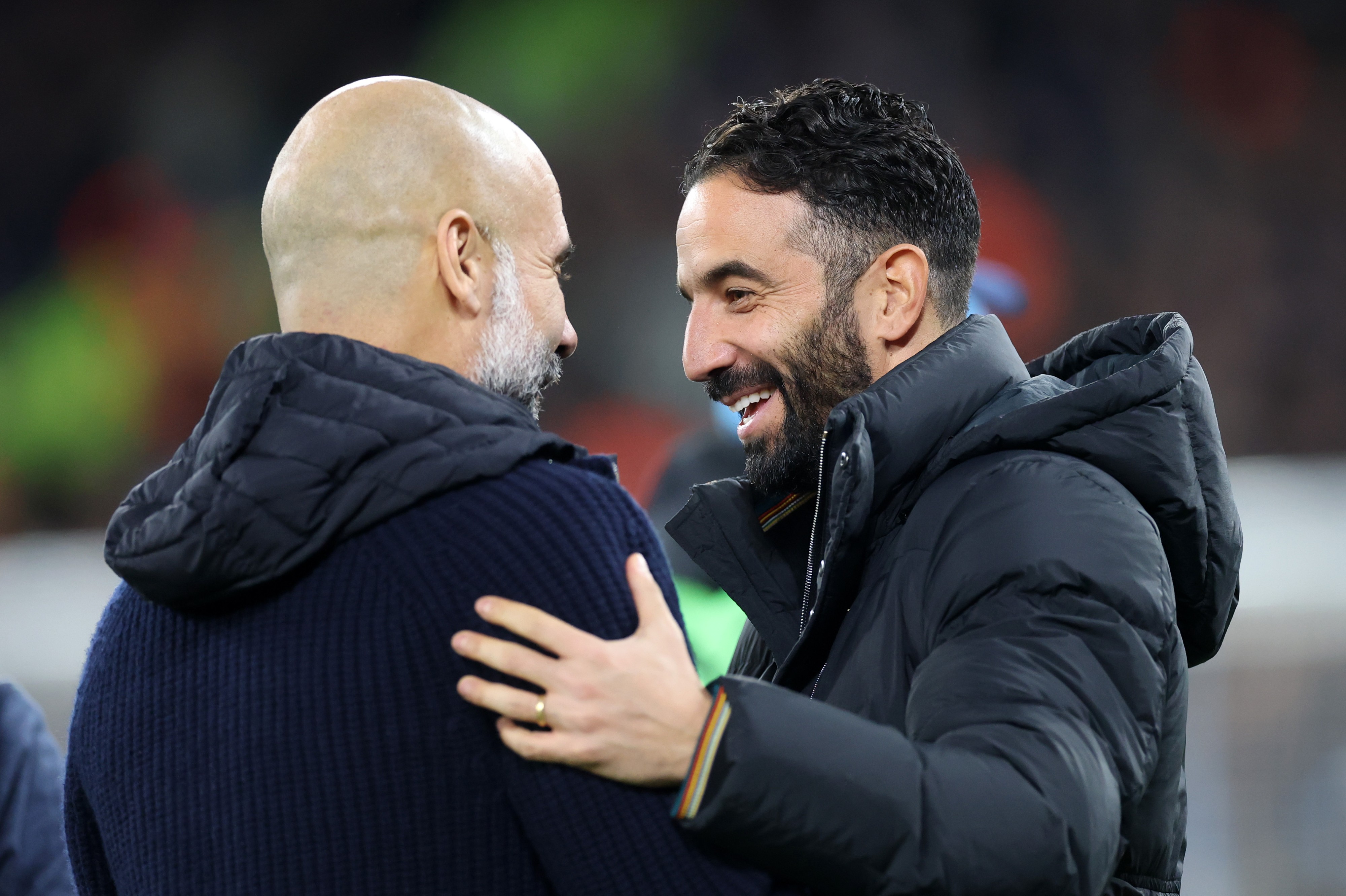 Pep Guardiola, Manager of Manchester City, and Ruben Amorim, Manager of Manchester United