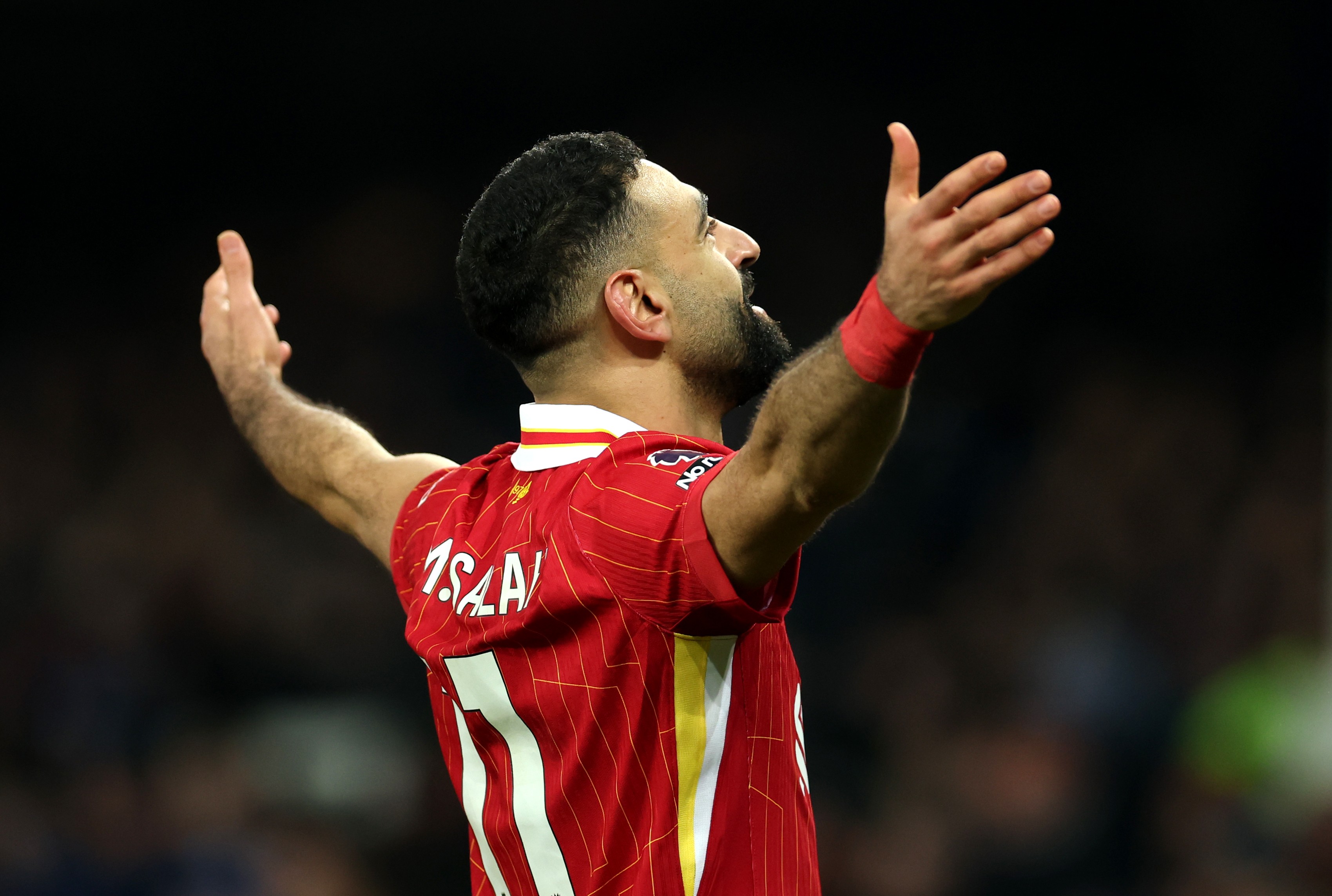 Mohamed Salah of Liverpool celebrates scoring his team's second goal during the Premier League match against Everton