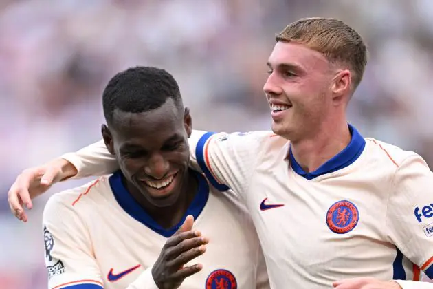 Cole Palmer of Chelsea celebrates scoring his team's third goal with Nicolas Jackson