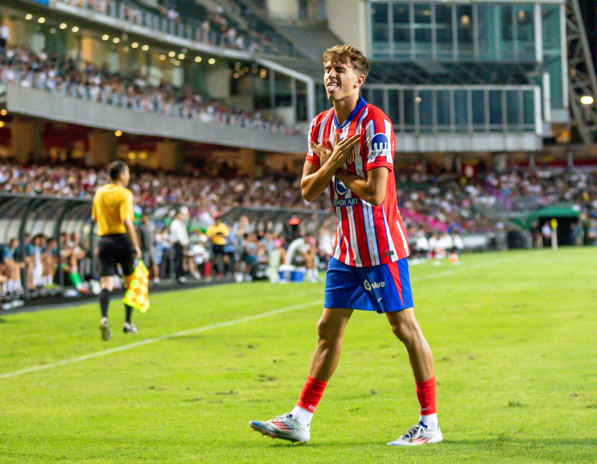 Adrian Nino celebrates a goal for Atletico Madrid