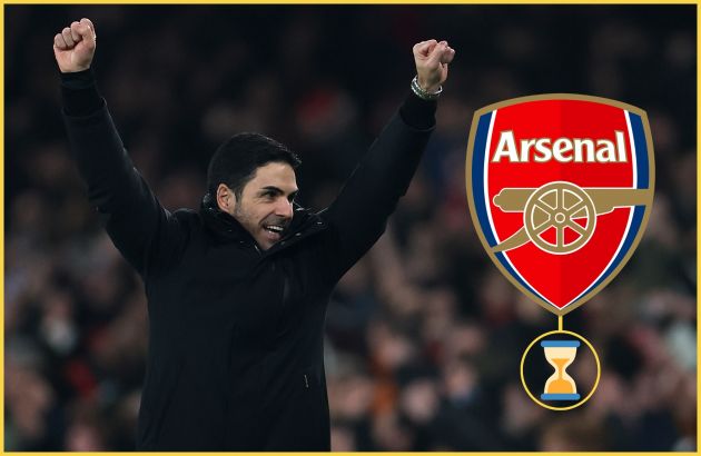 Mikel Arteta holds up his arms in celebration next to Arsenal club badge.