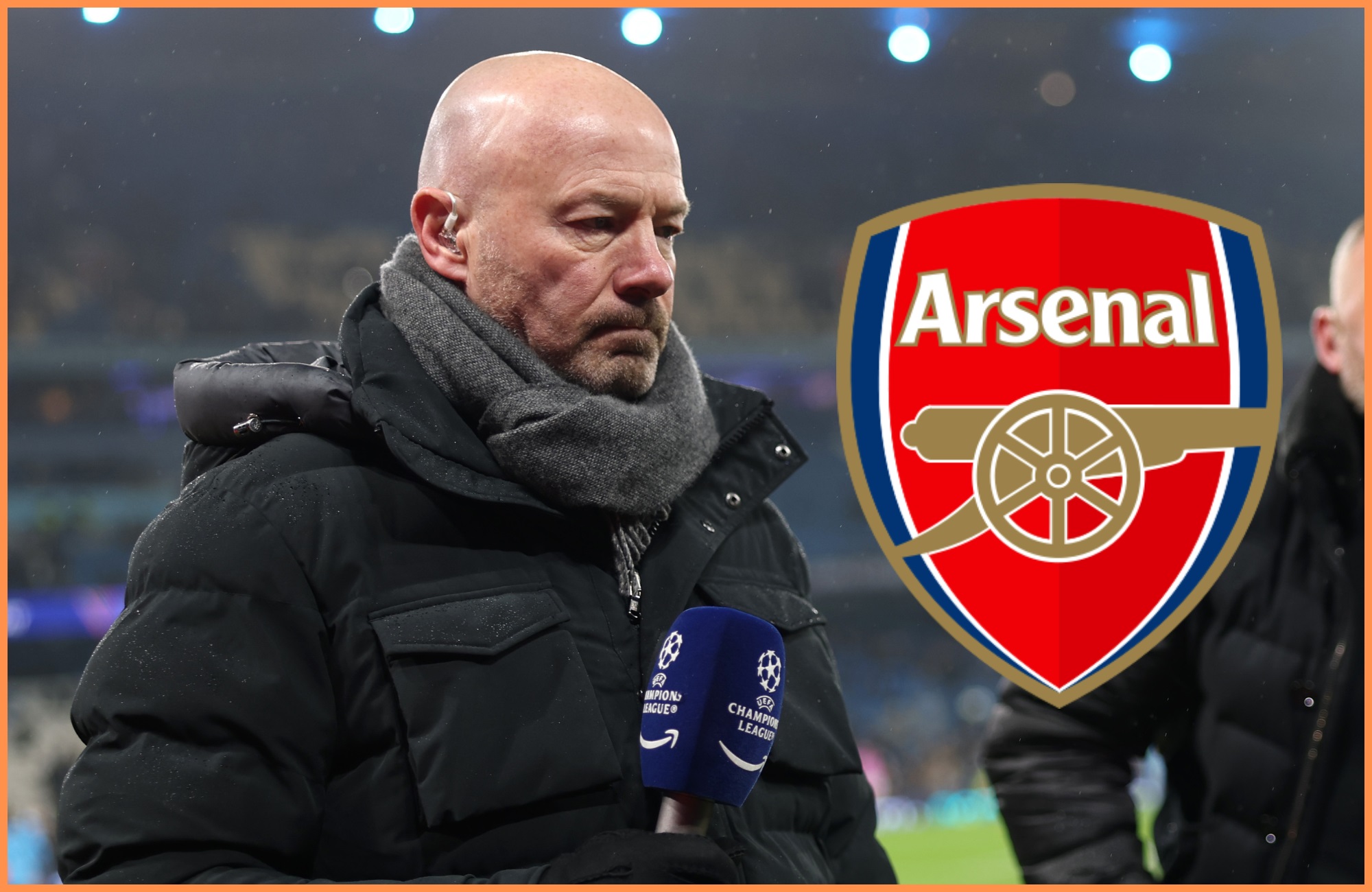 Alan Shearer looks at Arsenal club badge.
