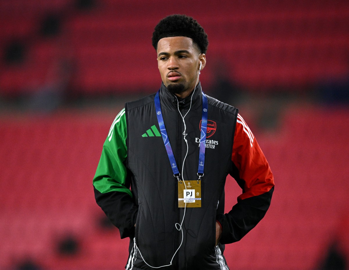 Ethan Nwaneri looks on before Arsenal's game at PSV
