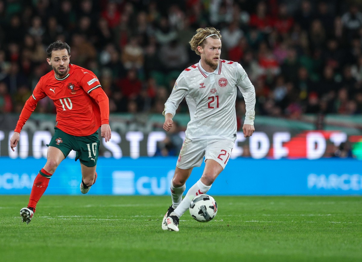 Morten Hjulmand in action for Denmark against Portugal