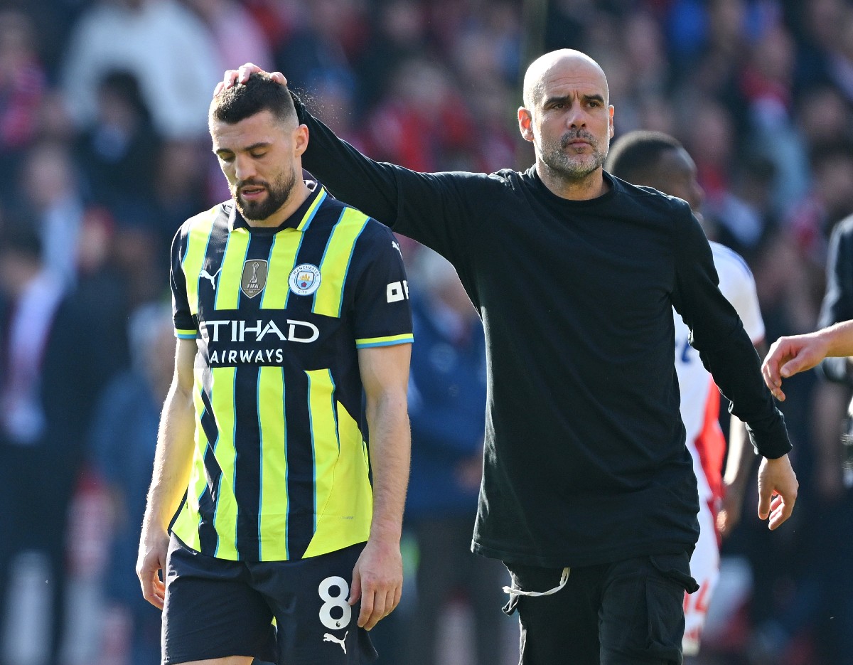 Pep Guardiola consoles Mateo Kovacic after Man City's defeat to Nottingham Forest