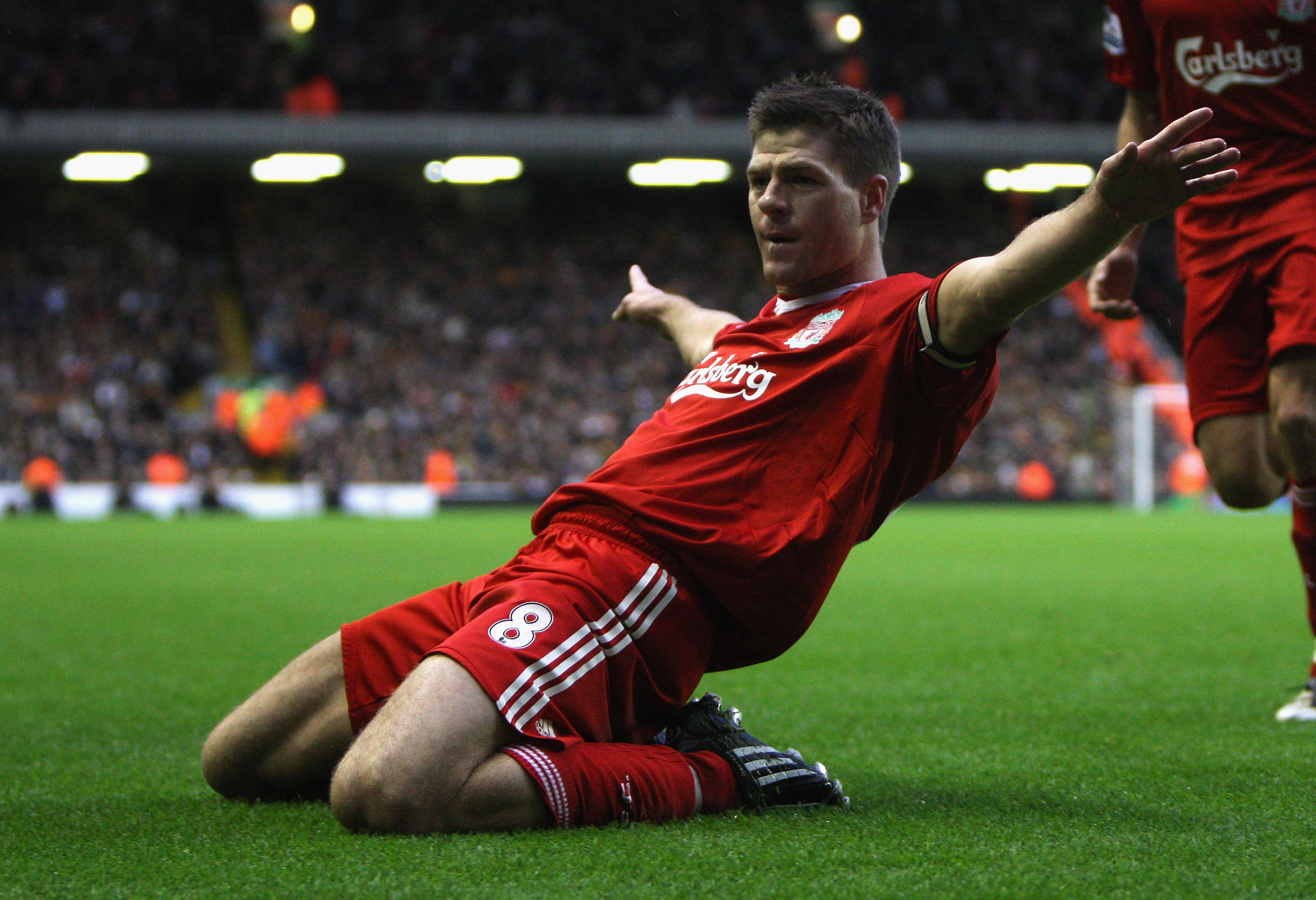 Steven Gerrard of Liverpool celebrates scoring his team's second goal vs Hull City