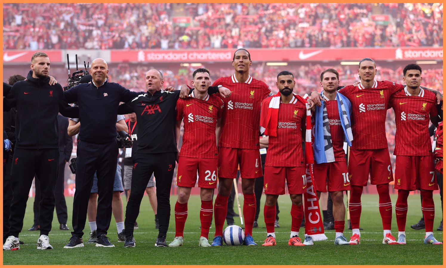 Liverpool players celebrate after winning the title