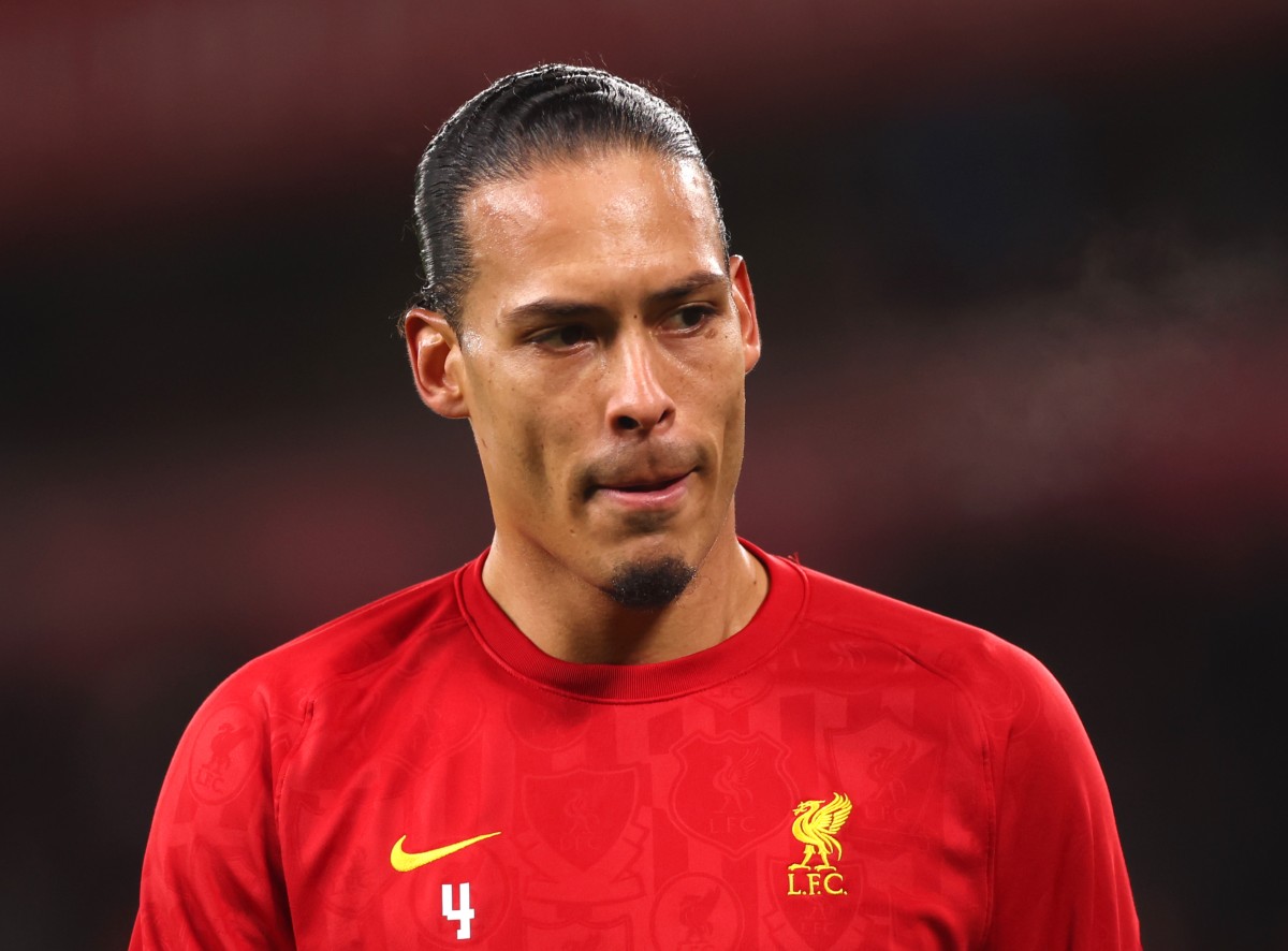 Virgil van Dijk warming up for Liverpool