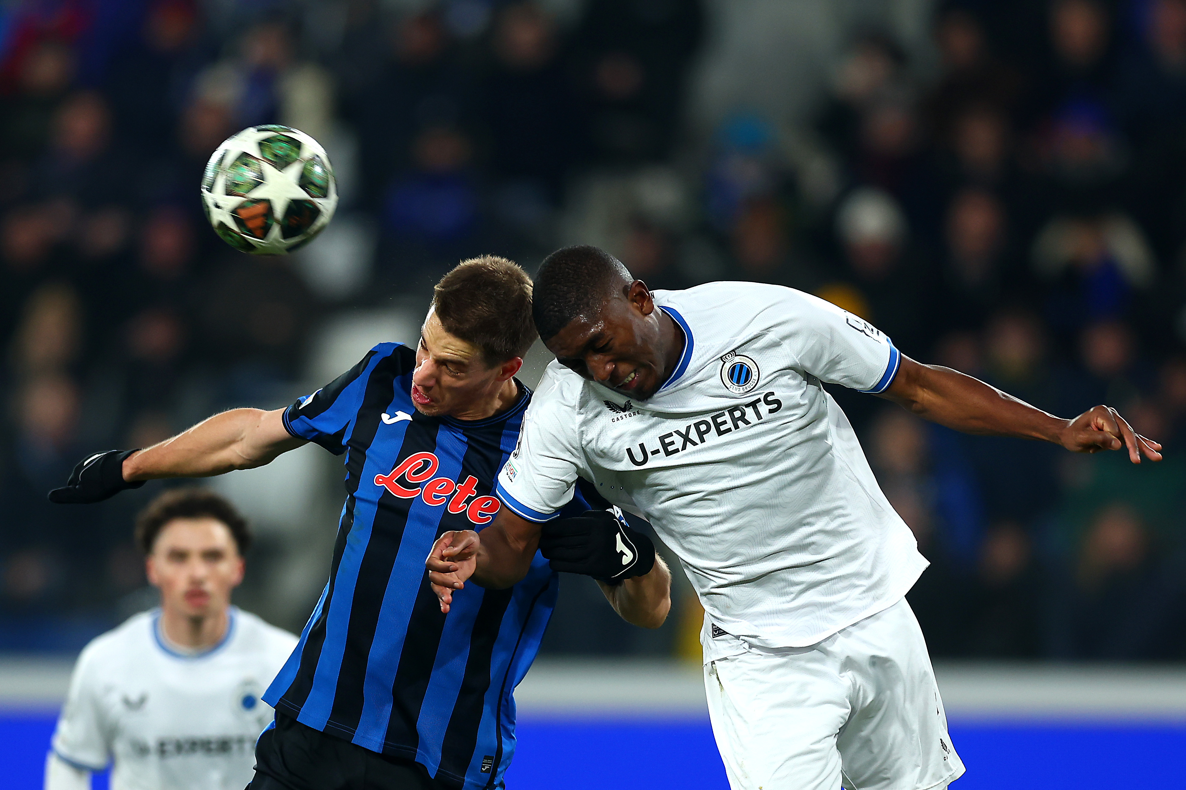 Mario Pasalic of Atalanta battles for a header with Joel Ordonez of Club Brugge