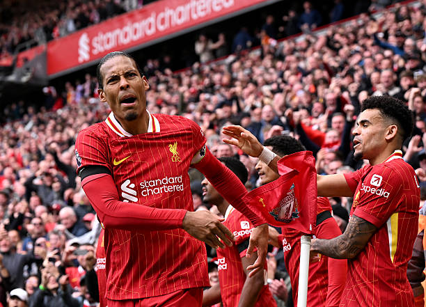 Liverpool captain Virgil van DIjk celebrates after scoring the winner