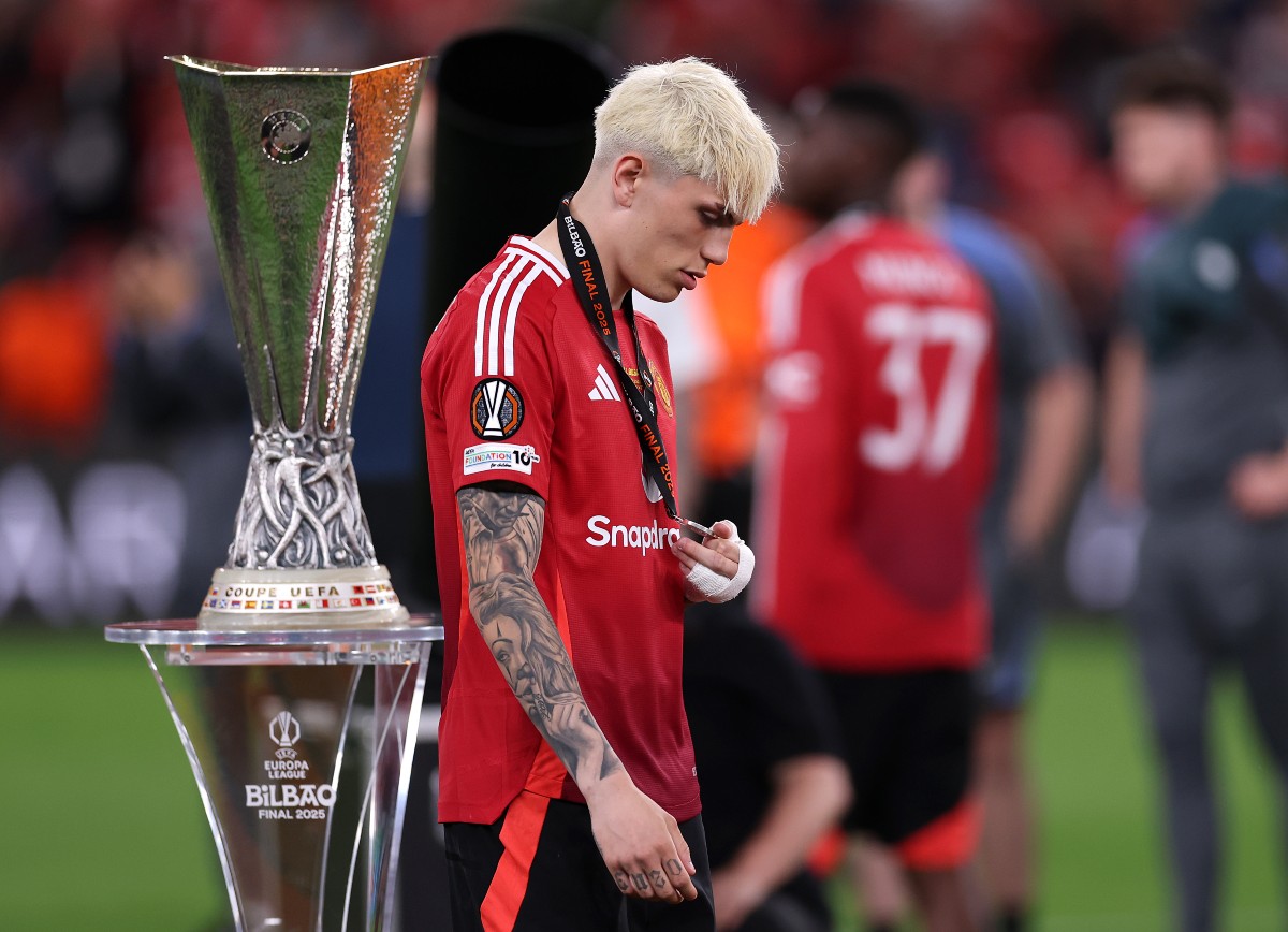 Alejandro Garnacho walks past the Europa League trophy after Man United's final defeat against Tottenham