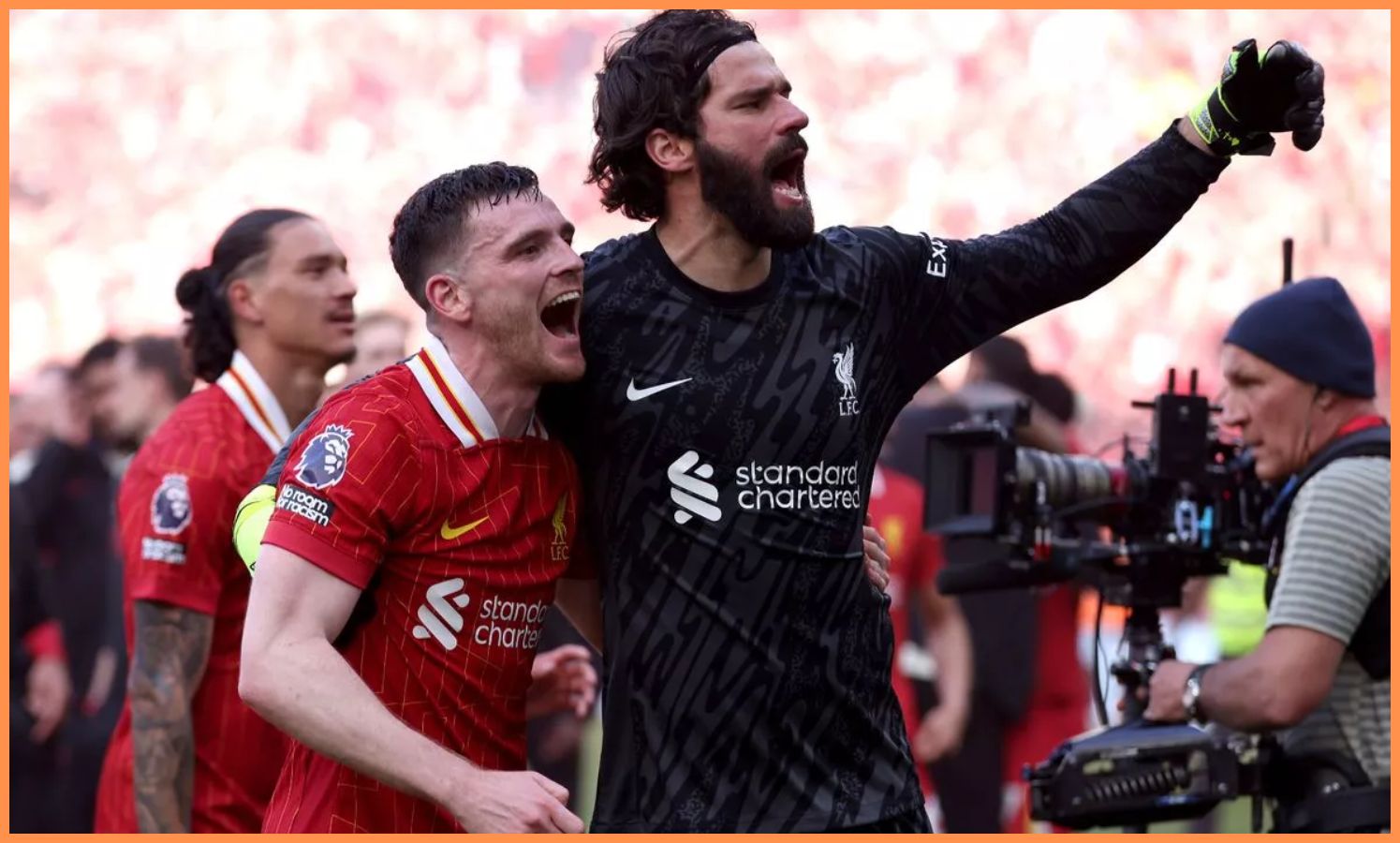 Andy Robertson and Alisson Becker