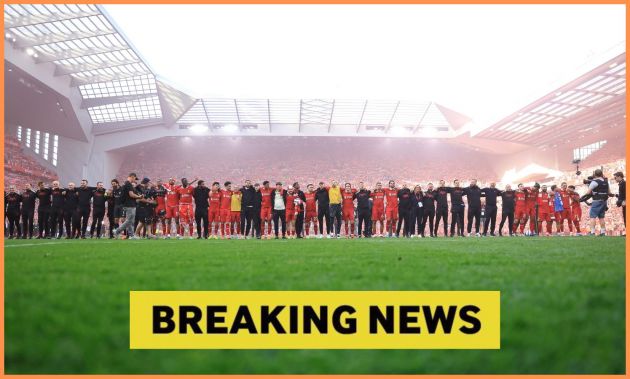 Liverpool players celebrate together after winning the Premier League title